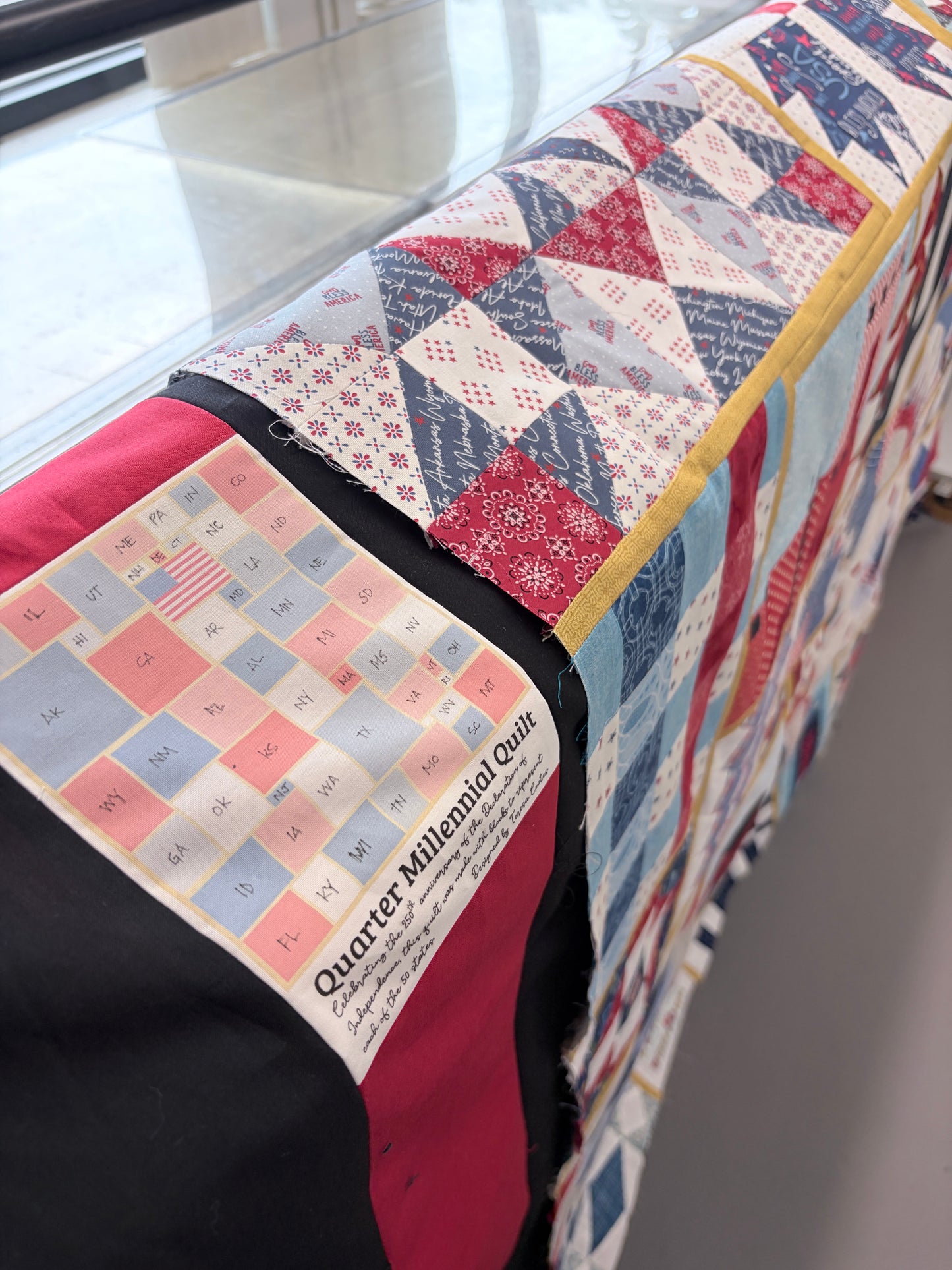 Quarter Millennial Quilt Label